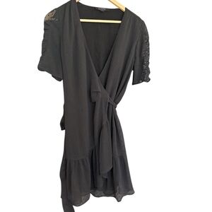 NOT FOR SALE Saints size 6 GUC sheer sleeved Black Wrap Dress with soft ruffles